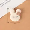 Nuevo Punto Mayorista Felpa Flor de Cinco Pétalos Cabeza de Conejo Linda Dibujos Animados Accesorios Decoración Sombreros, Zapatos y Calcetines para Niños