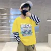 Camiseta de manga larga suelta de algodón puro para niños, camiseta interior de otoño para niños, estampado de dibujos animados, empalme de moda, camiseta de rayas