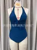 Aliexpress Amazon Bikini de una pieza color sólido simple con huecos y lazo de cintura alta Traje de baño de una pieza sin espalda estilo europeo y americano