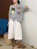 Elegante chaqueta suéter con lazo tridimensional, nuevo modelo otoño e invierno 2026, cárdigan de punto holgado de alta gama con cuello redondo para mujer