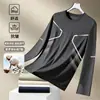 Camiseta de manga larga para hombre, capa interior de otoño para hombre, camiseta base elástica de corte holgado, camiseta estampada estilo coreano ins para hombre