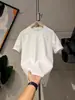 Camiseta de Manga Curta Estampada em Aço Novo Estilo Letra Popular Cor Sólida Camisa Básica Masculina Gola Redonda Estilo Coreano Peça Versátil