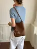 Bolso tote tejido retro de nicho transfronterizo 2026 nuevo de gran capacidad para el día a día, de hombro, casual, de doble hombro, para llevar debajo del brazo