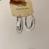 Pendientes Redondos Geométricos de Metal Estilo Transfronterizo Europeo y Americano Lujo Ligero Sensación de Alta Gama Pendientes de Botón Nicho Diseño Único Joyería de Oreja Simple