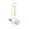 Copo de chá de leite iceberg de cristal garrafa flutuante chaveiro luminoso criativo pingente de mochila para copo de chá de leite boneca presente atacado