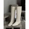 Pele de ovelha de alta qualidade 2026 outono e inverno novo estilo minimalista francês retrô botas longas que aumentam a altura para mulheres