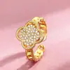 Anillo de Trébol de Cuatro Hojas de la Suerte con Diamantes Completos Estilo Coreano Estilo Ins para Mujeres, Lujo Ligero, Gama Alta, Ajustable, Anillo Sencillo de Joyería con Circonitas