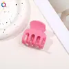 Nuevo pasador de pinza de garra pequeña de cuatro puntas esmerilado de Qiyue para coletas altas y recogidos en la nuca, pinza de tiburón de alta gama al por mayor