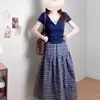 Conjunto de mujer talla grande 2026 nuevo estilo coreano versátil dulce cuello halter falso dos piezas falda a cuadros de manga corta conjunto de dos piezas