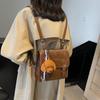 Mochila pequena da moda retrô de comércio exterior 2025, nova moda, cor contrastante, estilo britânico, europeia e americana, bolsa transversal de ombro único para mulheres