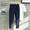 Pantalones negros elegantes de corte ajustado que te hacen parecer más alto y delgado, estilo americano nuevos pantalones casuales simples versátiles cómodos para hombre de verano