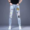 Calça jeans estampada da estação europeia primavera e outono, leggings elásticas slim fit da marca da moda masculina, estilo coreano, calças compridas bordadas da moda