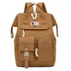 Bolsa para bebé y maternidad de comercio exterior al por mayor, multifuncional, elegante y casual, bolsa de mamá resistente al agua, mochila de gran capacidad para salidas