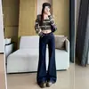 Calça jeans feminina levemente flare, novo estilo outono 2026, azul retrô, super popular, que cobre o quadril, elástica, calça flare que afina