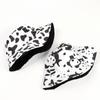 Venta caliente transfronteriza sombrero de pescador de panda de dibujos animados femenino coreano ocio vaca doble cara de ala plana sombrero para el sol al por mayor