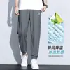 Pantalones deportivos casuales cruzados de secado rápido para hombre, corte holgado, estilo fino de verano, pantalones jogger de seda helada, nuevos pantalones de verano para hombre