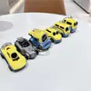 Llavero creativo de mini coche deportivo de fricción, coche de aleación con puertas que se abren, accesorio para mochila infantil, regalo de coche