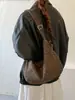 Bolso tote único con estampado de leopardo para mujer, nuevo modelo otoño e invierno 2026, gran capacidad, bolso versátil para el día a día, bolso de hombro y cruzado casual