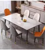Mesa de comedor de pizarra para uso doméstico, mesa de comedor moderna simple y de lujo ligero, juego de mesa y sillas de comedor rectangulares de mármol para apartamentos pequeños