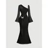 Vestido midi de gasa fina ligeramente transparente de color liso estilo chica picante con mangas acampanadas para mujer primavera y otoño transfronterizo decoración tridimensional ceñido a la cintura vestido largo de cola de pez