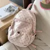 Mochila versátil de nicho estilo coreano para estudiantes universitarias, mochila ligera 2026 de moda estilo ins, modelo nuevo