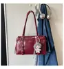 Bolso tote de nicho de alta gama estilo coreano 2026 para mujer, gran capacidad, bolso de hombro para ir al trabajo, bolso de mano moderno y versátil