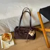 Bolsa de ombro retrô de design nicho transfronteiriço para mulheres, novo modelo outono 2026, bolsa de ombro texturizada estilo coreano para o dia a dia