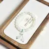 Pulseira de Ouro Seda Jade Estilo Chinês Novo Retrô Pulseira Lírio-do-Vale Lótus para Mulheres Pulseira Garra de Gato Verde Tianshan para Mulheres Venda por Atacado