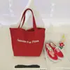 Moda 2025 Nova Bolsa Tote de Ombro com Letras Vermelhas Casual Estudante Nicho Comutador Grande Capacidade Bolsa de Lona