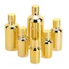 Botella vacía de vidrio galvanizado en oro para aceites esenciales, loción en aerosol, perfume, cosméticos, botellas separadas que evitan la luz.
