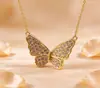 Lujo Ligero Suministro Directo de Fábrica Collar Colgante Mariposa Full Diamond Chapado en Oro Plata Dos Tonos Micro-Pavimentado Joyería Fábrica Mayorista