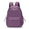 Mochila simple de color liso, gran capacidad, ligera, adecuada para ir al trabajo, estudiantes y viajes, una mochila elegante y ligera para senderismo