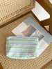 Bolsa de almacenamiento de tela a rayas coloridas frescas, neceser de maquillaje plisado femenino, bolsa portátil para cuidado de la piel y artículos de tocador varios