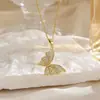 Verão 2025 novo estilo colar trevo de quatro folhas joias em aço titânio banhado a ouro franja pingente criativo ins alto senso