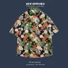 Camisa Floral de Manga Curta Havaí Masculina Ilha de Hainan Vestuário Moda Praia Sanya Litoral Viagem Casal Casual Solta Roupa de Fora