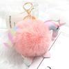 Nuevo llavero de bola de pelo de unicornio de ojos lindos estilo coreano, colgante de accesorios de coche y equipaje de bola de pelo de poni de dibujos animados