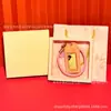 Llavero Qixi 520 Corazón a Corazón de Oro Puro para Pareja, para Hombres y Mujeres, Cadena para Teléfono Móvil, Colgante para Bolso, Pequeño Regalo al por Mayor