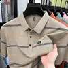 2026 Verano Cuello Solapa Hombres de Mediana Edad Camisa Polo de Manga Corta Nueva Rayas Bolsillo Real Cómoda Camiseta de Manga Corta Ropa de Hombre