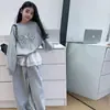 Conjunto de Moda Infantil 2026 Primavera/Outono Moletom com Laço Falso Duas Peças Calça Casual de Perna Larga Elegante Conjunto de Duas Peças Tendência