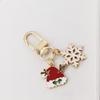 Llavero de Navidad Lindo Creativo Reno Colgante para Airpods Memoria USB Hebilla de Cremallera Anti-pérdida Accesorios