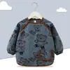 Babero de terciopelo de cristal para bebé, impermeable, antidesgaste, con bolsillo de arroz, para otoño e invierno, delantal para madre y bebé.