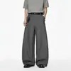 Pantalones de hombre de estilo americano a rayas verticales con caída curva de moda, otoño 2026, holgados, corte limpio, pierna ancha, vintage