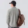 Camisa Masculina de Manga Longa 2026 Nova Coleção Primavera e Outono Bordada Gola Reversível Solta Versátil Casual Tendência Jaqueta