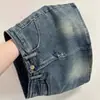 Falda vaquera retro azul de cintura alta adelgazante para mujer, nuevo estilo de verano, lavado americano, anti-exposición, línea A, minifalda ajustada a la cadera