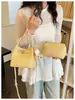 Bolsa de Mão de Luxo Nicho Modelo Balde para Mulheres 2026 Novo Modelo com Padrão Lichia, Moda de Luxo Leve Versátil para Ombro e Transversal