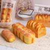 Material PU molhado macio de recuperação lenta simulação pão comida adereços amassar modelo de descompressão descompressão croissant pão torcido
