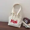 Versión Coreana Transfronteriza 2026 Verano Nuevo Bolso Tote Casual de Gran Capacidad con Estampado de Letras Ligero Estilo Perezoso Bolso de Hombro