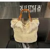 Bolso Tejido Hueco Chic de Lujo Ligero 2026 Nuevo Verano Bolso Tote de Alta Gama de Gran Capacidad Bolso Casual Tejido de Paja