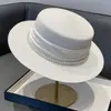 Elegante Chapéu de Palha com Topo Plano Estilo Francês 2026 Novo Chapéu de Sol de Palha Elegante com Pérolas para Mulheres