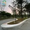 Nueva piedra charm fábrica suministro directo piedra UHPC imitación flor de piedra taburete para piscina terrazo blanco taburete de cemento curvo asiento GRC